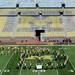 Members of the Michigan marching band, dance and cheer teams form the state of Michigan and the upper peninsula on the field during a Pure Michigan video shoot at Michigan Stadium on Wednesday. Melanie Maxwell I AnnArbor.com